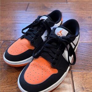 Nike Black and Orange Golf Jordan Sneakers